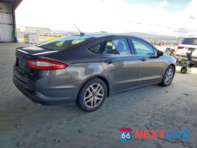 Trzecie zdjęcie samochodu z tyłu: 2016 FORD FUSION SE VIN:3FA6P0H73GR386890 - miniatura