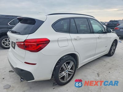 Trzecie zdjęcie samochodu z tyłu: 2018 BMW X1 SDRIVE28I VIN:WBXHU7C32J5H42660 - miniatura