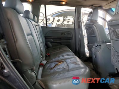 Zdjęcie 11 z 13 samochodu: 2005 HONDA PILOT EXL VIN:2HKYF18725H525807 - miniatura