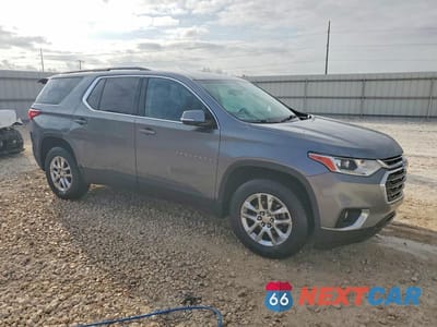 Czwarte zdjęcie samochodu z boku: 2019 CHEVROLET TRAVERSE LT VIN:1GNERGKWXKJ115263 - miniatura