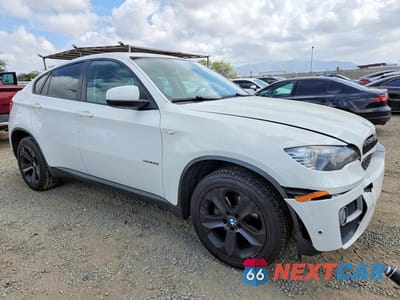 Czwarte zdjęcie samochodu z boku: 2014 BMW X6 XDRIVE35I VIN:5UXFG2C55E0H11498 - miniatura