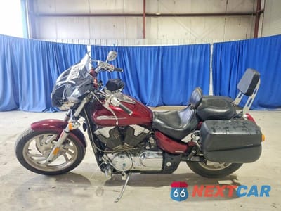 Trzecie zdjęcie samochodu z tyłu: 2006 HONDA VTX1300 C VIN:1HFSC55016A215000 - miniatura