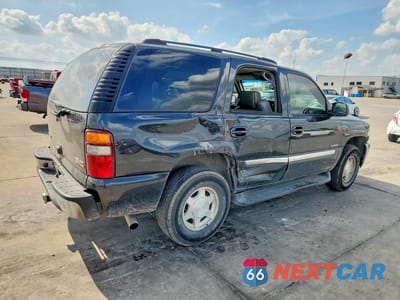 Trzecie zdjęcie samochodu z tyłu: 2003 GMC YUKON VIN:1GKEC13ZX3J337291 - miniatura