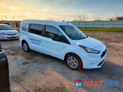 Czwarte zdjęcie samochodu z boku: 2021 FORD TRANSIT CONNECT VIN:NM0GS9F29M1485872 - miniatura