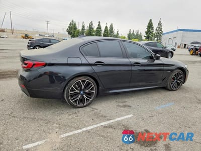 Trzecie zdjęcie samochodu z tyłu: 2022 BMW 530E VIN:WBA13AG05NCJ42189 - miniatura