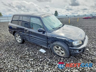 Czwarte zdjęcie samochodu z boku: 1999 TOYOTA RAV4 BASE VIN:JT3HP10V6X7122013 - miniatura