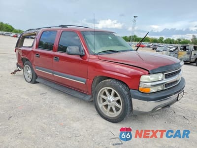 Czwarte zdjęcie samochodu z boku: 2002 CHEVROLET SUBURBAN C1500 VIN:1GNEC16Z52J332111 - miniatura
