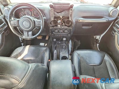 Zdjęcie 8 z 14 samochodu: 2016 JEEP WRANGLER UNLIMITED SAHARA VIN:1C4BJWEG2GL338183 - miniatura