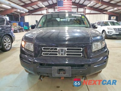 Piąte zdjęcie samochodu w środku: 2006 HONDA RIDGELINE RTL VIN:2HJYK16536H549018 - miniatura