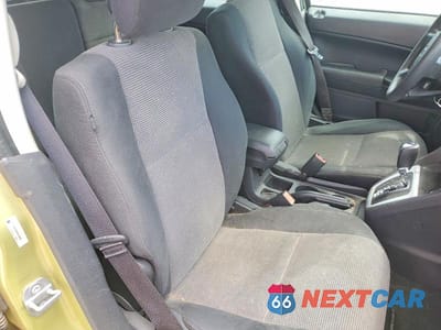 Zdjęcie 10 z 12 samochodu: 2010 DODGE CALIBER MAINSTREET VIN:1B3CB3HA9AD568099 - miniatura