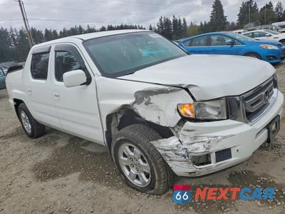 Czwarte zdjęcie samochodu z boku: 2009 HONDA RIDGELINE RTS VIN:5FPYK16429B101690 - miniatura