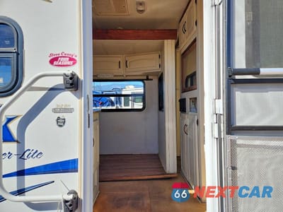 Piąte zdjęcie samochodu w środku: 2012 KEYSTONE OUTBACK CAMPER VIN:4YDT31224CB453357 - miniatura