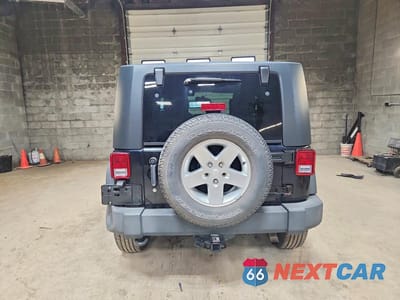 Zdjęcie 6 z 12 samochodu: 2010 JEEP WRANGLER SPORT VIN:1J4AA2D19AL162395 - miniatura