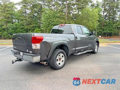 Czwarte zdjęcie samochodu z boku: 2011 TOYOTA TUNDRA DOUBLE CAB SR5 VIN:5TFRM5F16BX025150 - miniatura