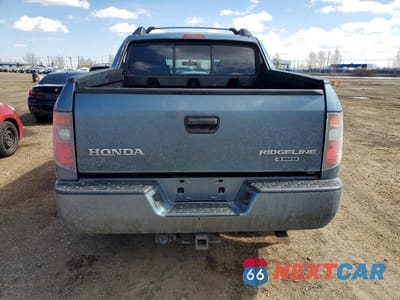 Zdjęcie 6 z 13 samochodu: 2006 HONDA RIDGELINE RTS VIN:2HJYK16446H003688 - miniatura