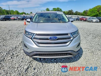 Piąte zdjęcie samochodu w środku: 2017 FORD EDGE TITANIUM VIN:2FMPK3K93HBB34304 - miniatura