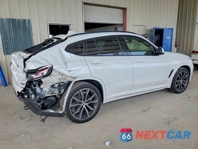 Trzecie zdjęcie samochodu z tyłu: 2021 BMW X4 XDRIVE30I VIN:5UX2V1C08M9H67626 - miniatura