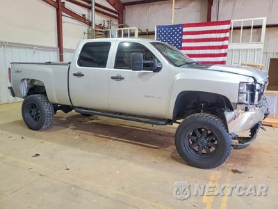 Czwarte zdjęcie samochodu z boku: 2013 CHEVROLET SILVERADO K2500 HEAVY DUTY VIN:1GC1KVCG8DF128221 - miniatura