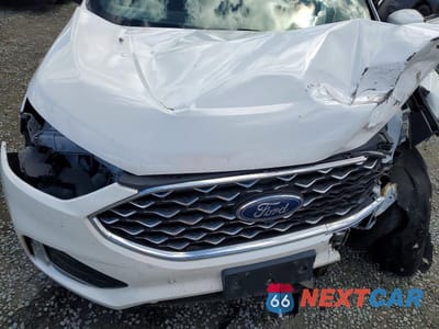 Zdjęcie 12 z 13 samochodu: 2022 FORD EDGE TITANIUM VIN:2FMPK4K91NBB01884 - miniatura