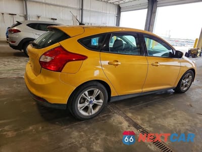 Trzecie zdjęcie samochodu z tyłu: 2012 FORD FOCUS SE VIN:1FAHP3K23CL284747 - miniatura