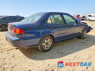 Trzecie zdjęcie samochodu z tyłu: 2002 TOYOTA COROLLA VIN:2T1BR12E62C532553 - miniatura