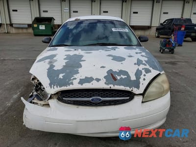 Piąte zdjęcie samochodu w środku: 2001 FORD TAURUS LX VIN:1FAFP52201A238921 - miniatura