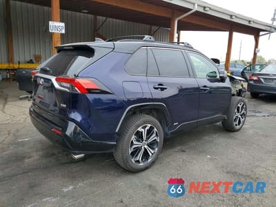 Trzecie zdjęcie samochodu z tyłu: 2023 TOYOTA RAV4 PRIME XSE VIN:JTMEB3FV1PD117335 - miniatura