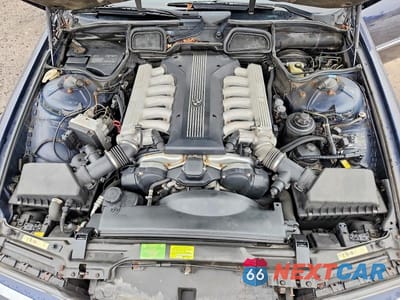 Zdjęcie 11 z 12 samochodu: 1998 BMW 750IL 4P VIN:WBAGK2320WDH69133 - miniatura