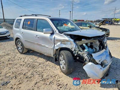 Czwarte zdjęcie samochodu z boku: 2011 HONDA PILOT TOURING VIN:5FNYF4H9XBB032454 - miniatura