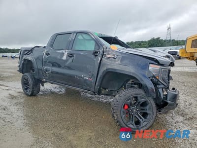 Czwarte zdjęcie samochodu z boku: 2023 GMC SIERRA K1500 AT4 VIN:1GTUUEEL9PZ246783 - miniatura