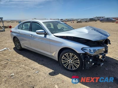 Czwarte zdjęcie samochodu z boku: 2019 BMW 530E VIN:WBAJA9C56KB389101 - miniatura