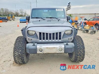 Piąte zdjęcie samochodu w środku: 2014 JEEP WRANGLER UNLIMITED SAHARA VIN:1C4BJWEG7EL296431 - miniatura