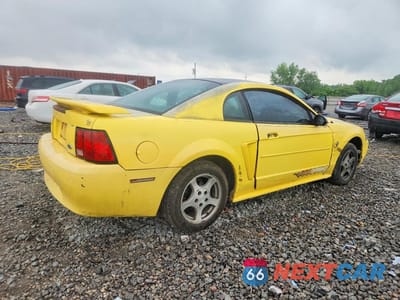 Trzecie zdjęcie samochodu z tyłu: 2003 FORD MUSTANG VIN:1FAFP40403F359646 - miniatura