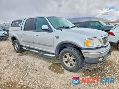 Czwarte zdjęcie samochodu z boku: 2003 FORD F150 SUPERCREW VIN:1FTRW08L43KD84233 - miniatura