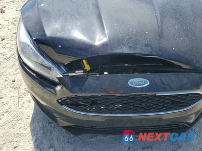 Zdjęcie 9 z 9 samochodu: 2018 FORD FOCUS S VIN:1FADP3E21JL299044 - miniatura