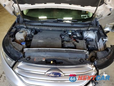 Zdjęcie 12 z 13 samochodu: 2015 FORD EDGE SEL VIN:2FMTK4J83FBB25922 - miniatura