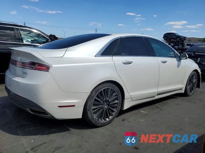Trzecie zdjęcie samochodu z tyłu: 2015 LINCOLN MKZ HYBRID VIN:3LN6L2LU6FR625874 - miniatura