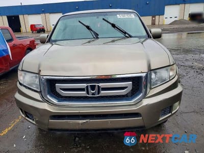 Piąte zdjęcie samochodu w środku: 2010 HONDA RIDGELINE RTS VIN:5FPYK1F43AB010318 - miniatura