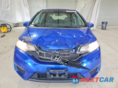 Piąte zdjęcie samochodu w środku: 2016 HONDA FIT LX VIN:JHMGK5H5XGX032640 - miniatura