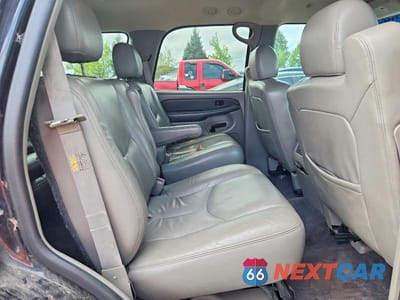 Zdjęcie 11 z 13 samochodu: 2003 GMC YUKON VIN:1GKEK13ZX3R110798 - miniatura