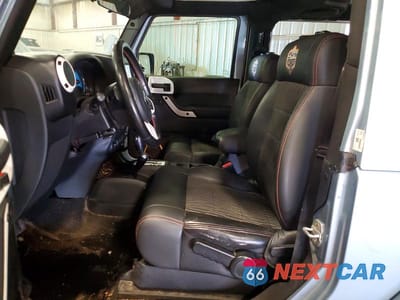 Zdjęcie 7 z 13 samochodu: 2012 JEEP WRANGLER SAHARA VIN:1C4AJWBG5CL174390 - miniatura