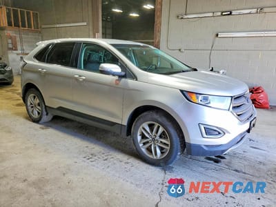 Czwarte zdjęcie samochodu z boku: 2015 FORD EDGE SEL VIN:2FMTK4J83FBB25922 - miniatura
