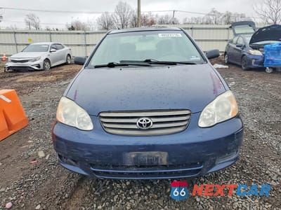 Piąte zdjęcie samochodu w środku: 2003 TOYOTA COROLLA LE VIN:2T1BR32E83C081350 - miniatura