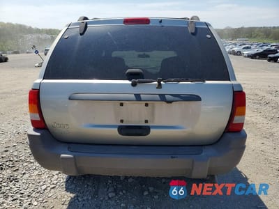 Zdjęcie 6 z 13 samochodu: 2004 JEEP GRAND CHEROKEE LAREDO VIN:1J4GW48S94C269140 - miniatura