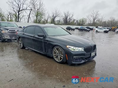 Czwarte zdjęcie samochodu z boku: 2018 BMW 750 XI VIN:WBA7F2C51JG424101 - miniatura