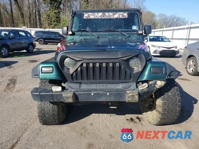 Piąte zdjęcie samochodu w środku: 1999 JEEP WRANGLER / TJ SPORT VIN:1J4FY19S1XP424277 - miniatura