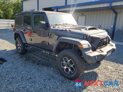 Czwarte zdjęcie samochodu z boku: 2020 JEEP WRANGLER UNLIMITED SPORT VIN:1C4HJXDN7LW113735 - miniatura
