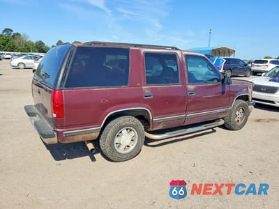 Trzecie zdjęcie samochodu z tyłu: 1995 CHEVROLET TAHOE C1500 VIN:1GNEC13K6SJ397881 - miniatura