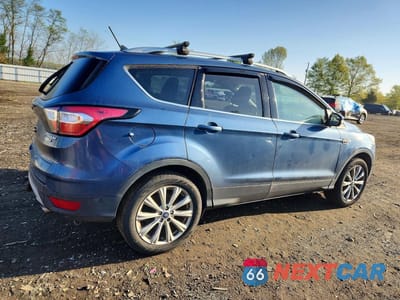 Trzecie zdjęcie samochodu z tyłu: 2018 FORD ESCAPE TITANIUM VIN:1FMCU9J92JUA66963 - miniatura