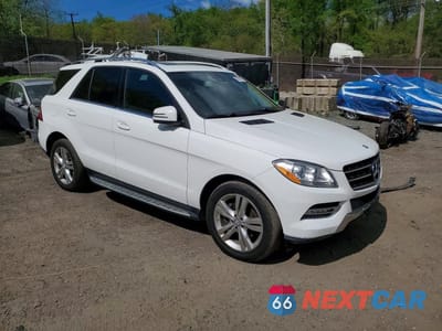 Czwarte zdjęcie samochodu z boku: 2015 MERCEDES-BENZ ML 250 BLUETEC VIN:4JGDA0EB4FA498548 - miniatura